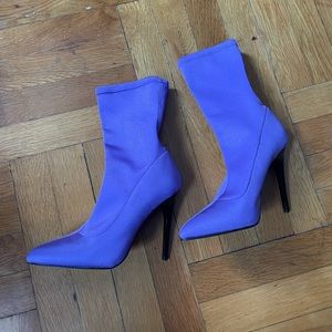 Bright purple stretchy high heels boots